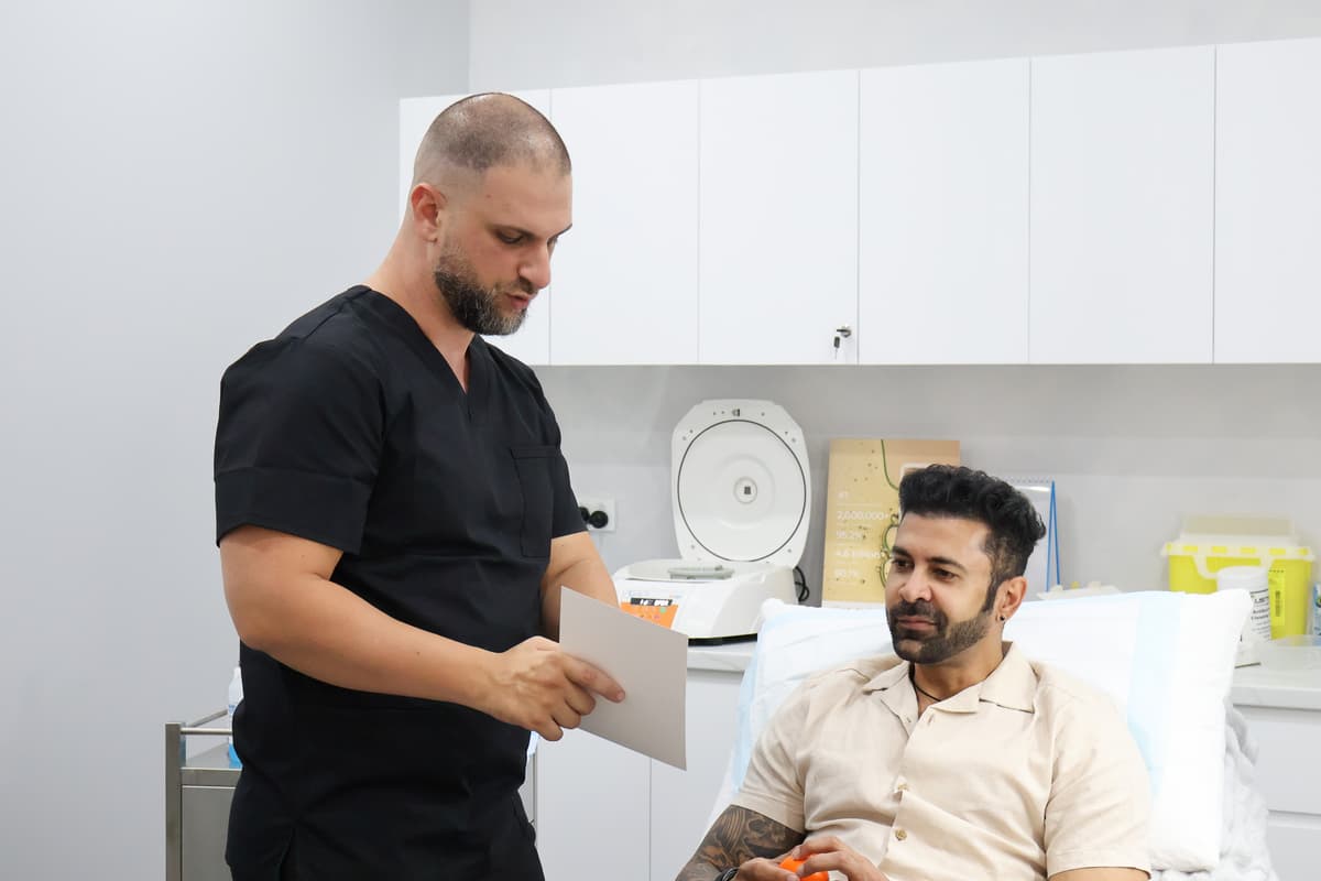 Nurse Sam consulting with a patient about PRP treatment